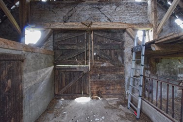 <p>Binnenzijde van de baander in de zuidgevel van de schuur. Deze gevel kwam tot stand bij een uitbreiding in 1888. </p>
